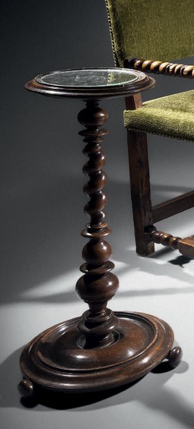 Molded and turned walnut light stand. Circular...
