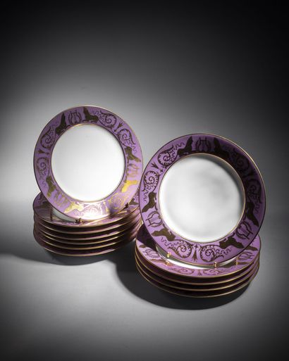 Paris
Twelve porcelain dessert plates decorated...