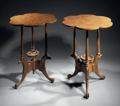 Pair of pedestal tables in natural wood....