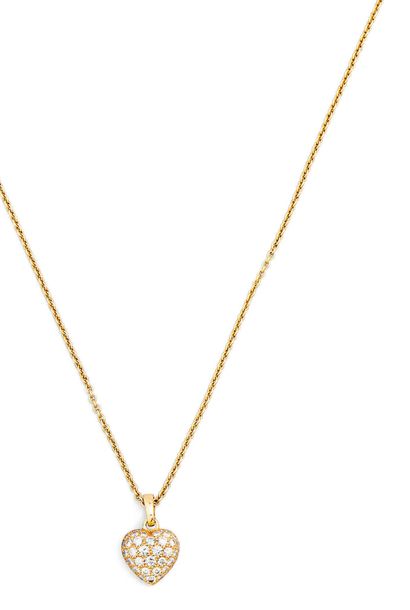 CARTIER
Chaîne forçat et son pendentif cœur...
