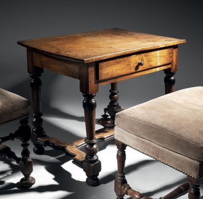Rectangular table in molded, carved walnut...