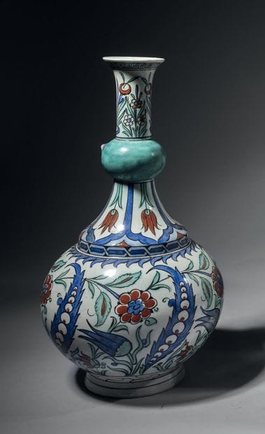 Samson
Large earthenware bottle with blue,...