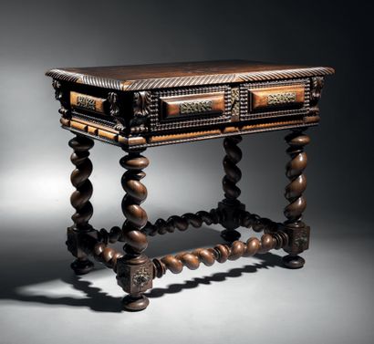 Small rosewood table. Torso column legs like...