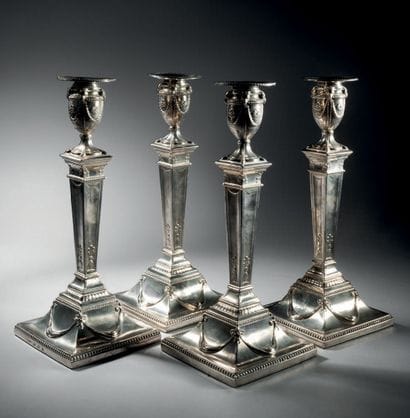Suite of four English 925°/°° silver torches...