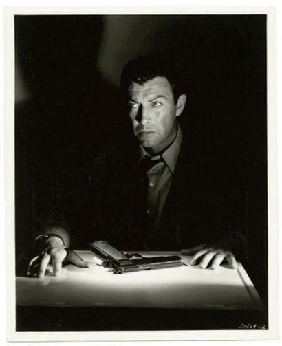 (CURTIS BERNHARDT)
Robert Taylor Le mur des...