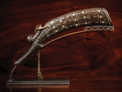 Zoomorphic powder flask
Cattle horn, brass...