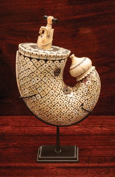 Zoomorphic powder flask
Ivory, black paste,...