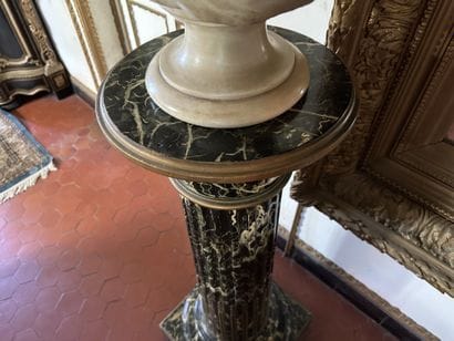 Column in wood painted to imitate sea-green...