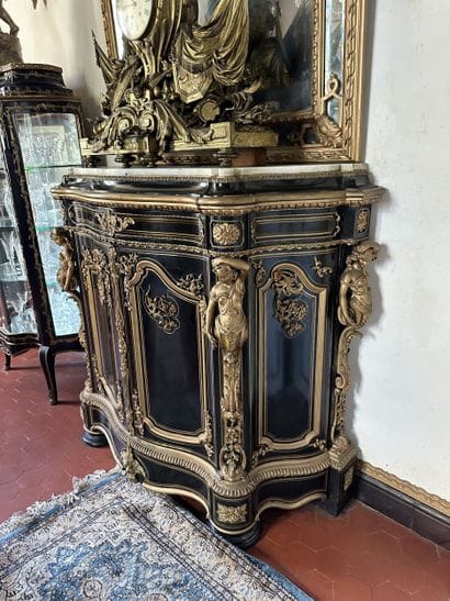 A blackened wood, brass fillet and very rich...