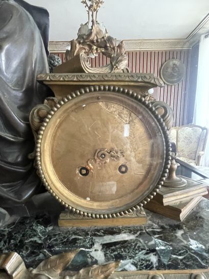 Important clock in sea-green marble and gilded...