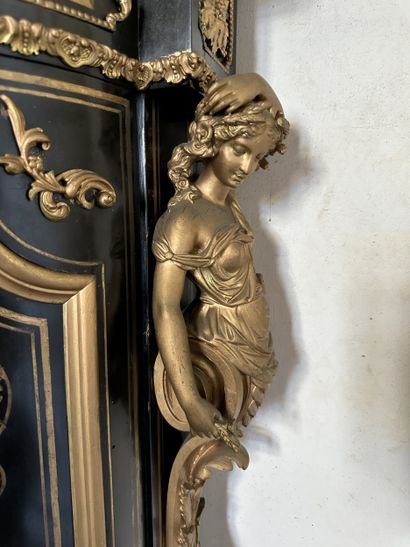 A blackened wood, brass fillet and very rich...