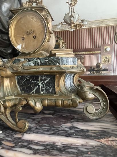 Important clock in sea-green marble and gilded...