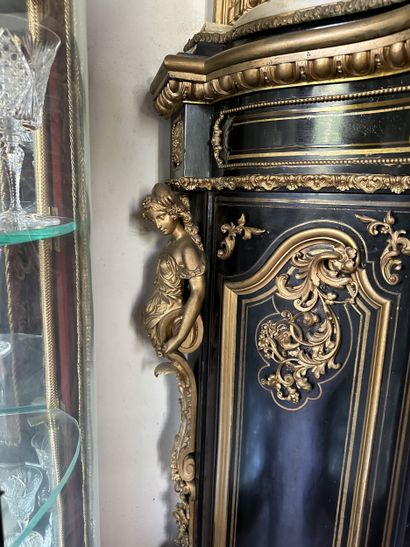 A blackened wood, brass fillet and very rich...