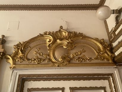 Suite of three pediments in carved wood,...