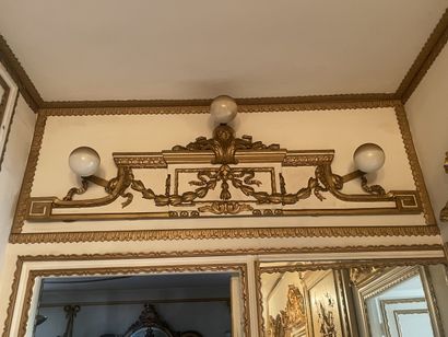 Pair of pediments in carved wood, cream lacquered...