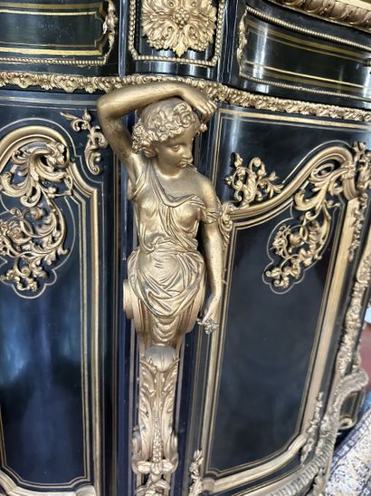 A blackened wood, brass fillet and very rich...