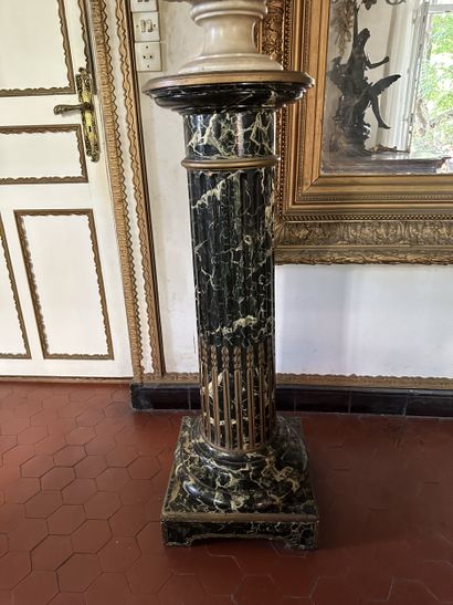 Column in wood painted to imitate sea-green...
