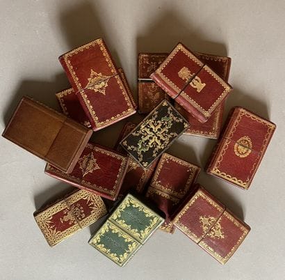 almanac cases. Set of 12 in-18 red morocco...