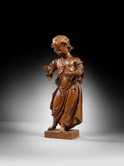 Ange en chêne sculpté, dos en partie creusé....