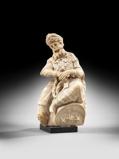 Prisonnier ottoman assis en albâtre sculpté,...