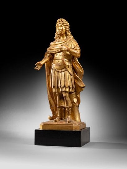 Louis XIV en bois stuqué et doré. Le roi...