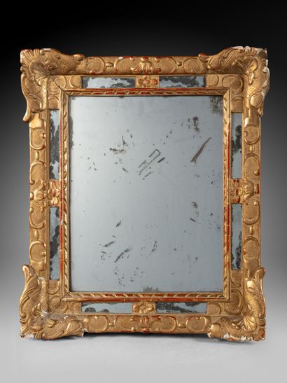 Wood and gilded stucco mirror with glazing...