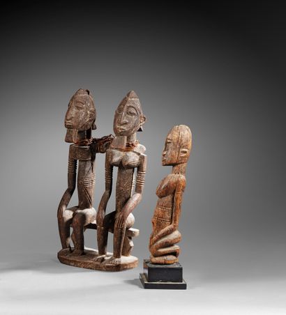 Set of two Dogon-style statues, Mali
Wood
H....