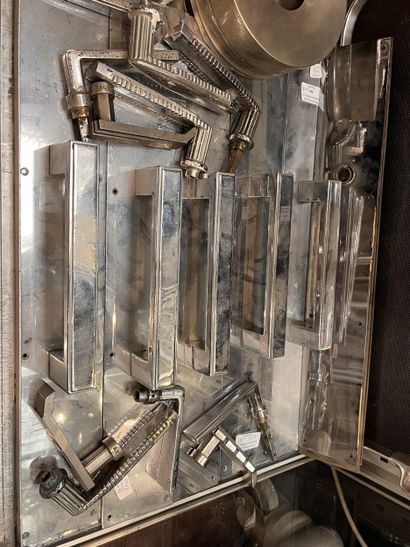 CONTEMPORARY WORK
Suite of five chrome-plated...