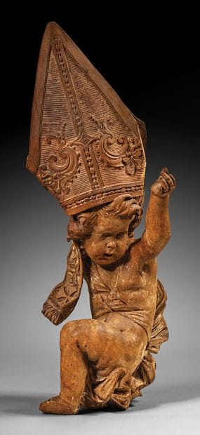 Large angel with mitred head, carved in basswood...