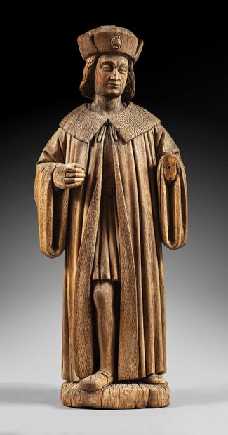 Civilian figure in walnut carved in the round...