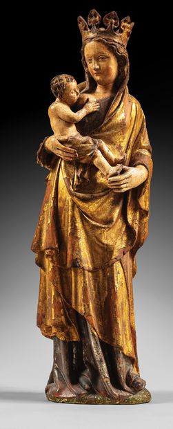 Rare Virgin and Child nursing in walnut carved...