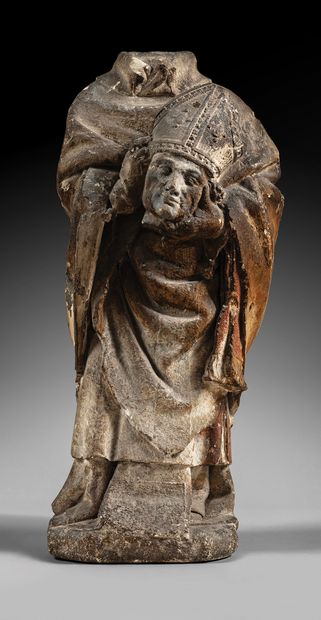 Saint Denis in limestone carved in the round...