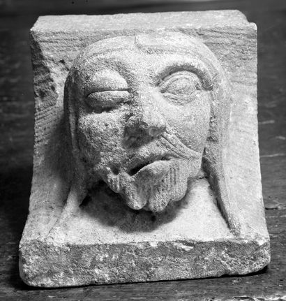 Romanesque modillon
Male head
Limestone
Ile...