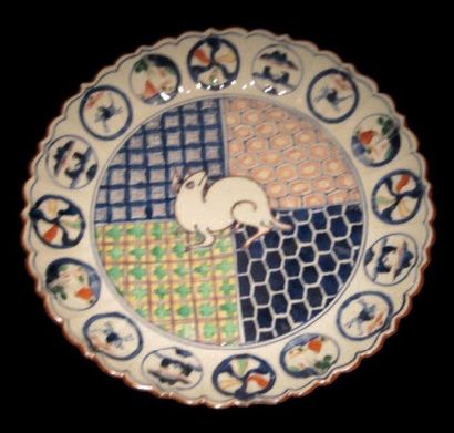QUATRE ASSIETTES POLYLOBÉES Japon, Arita...