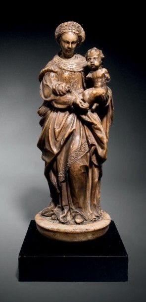 VIERGE À L'ENFANT en albâtre sculpté en ronde-bosse....