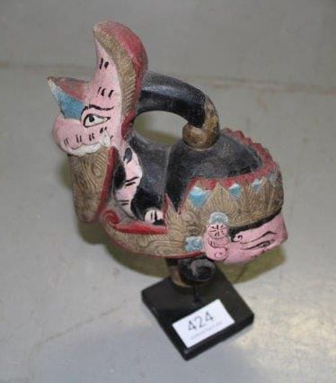 Indonésie, Bali

Trois têtes de marionnettes...