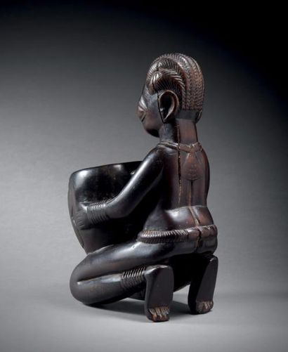 Porteuse de coupe Yorouba, Nigeria
Bois à...