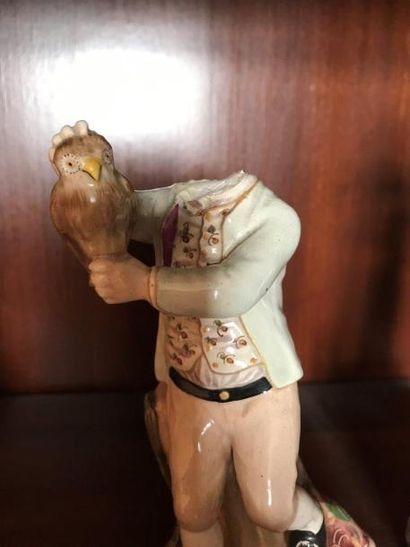 Suite de deux statuettes en faience polychrome
Jeune...