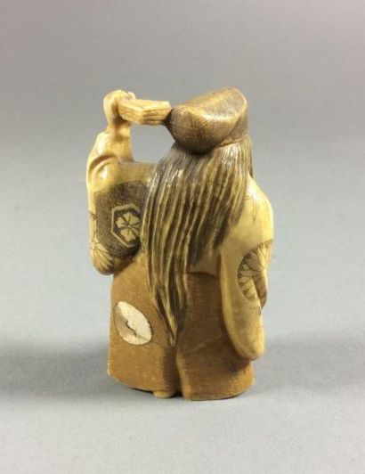 Netsuke en ivoire visage mobile Accidents...