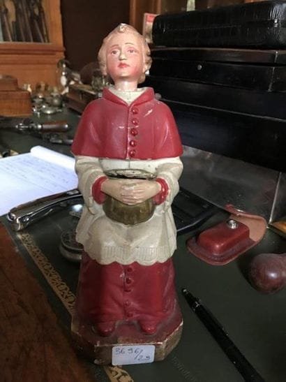 Tirelire figurant un Enfant de coeur à tête...