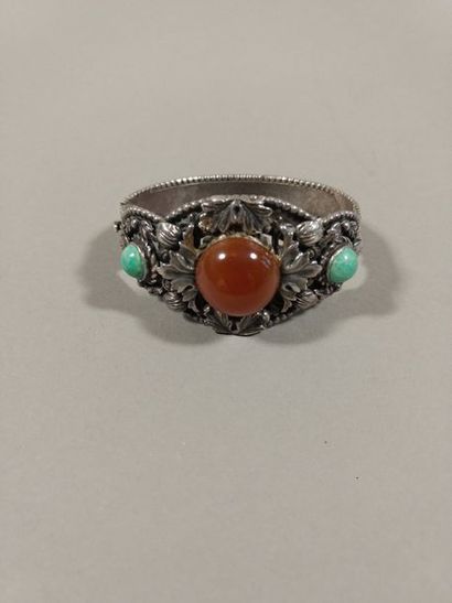 Bracelet jonc en argent 800e à décor de feuillages...