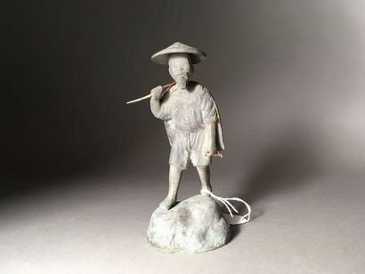CHINE
Porteur d'eau Figure en bronze
H. 18...