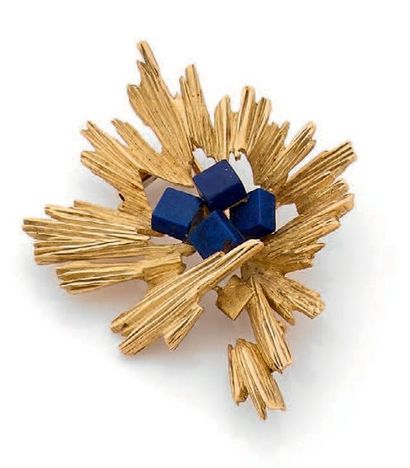 Clip de corsage en or jaune 18K(750) stylisé...