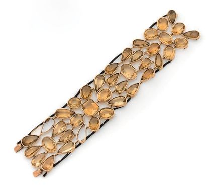 Rare bracelet souple en or jaune 18K (750)...