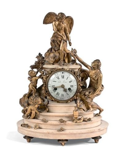 Pendule en marbre blanc et bronze ciselé...