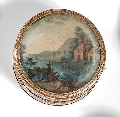 Boîte ronde en composition, incrustée et...