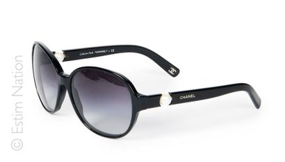 CHANEL
Pair of black bakelite sunglasses,...