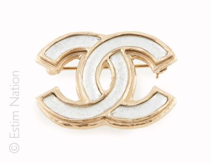 CHANEL (2012)
Gold-silver metal brooch featuring...