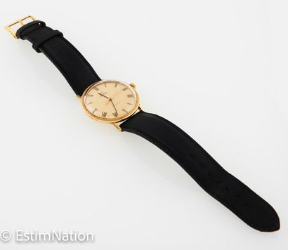 OMEGA
18K 750 mils yellow gold town man's...