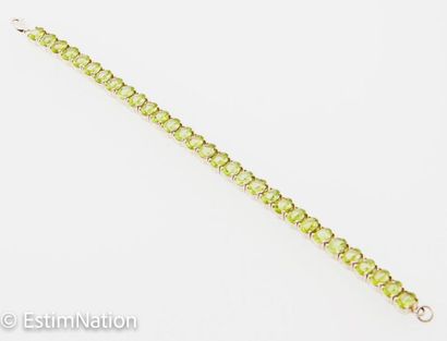 BRACELET ARGENT PERIDOTS 
Articulated bracelet...